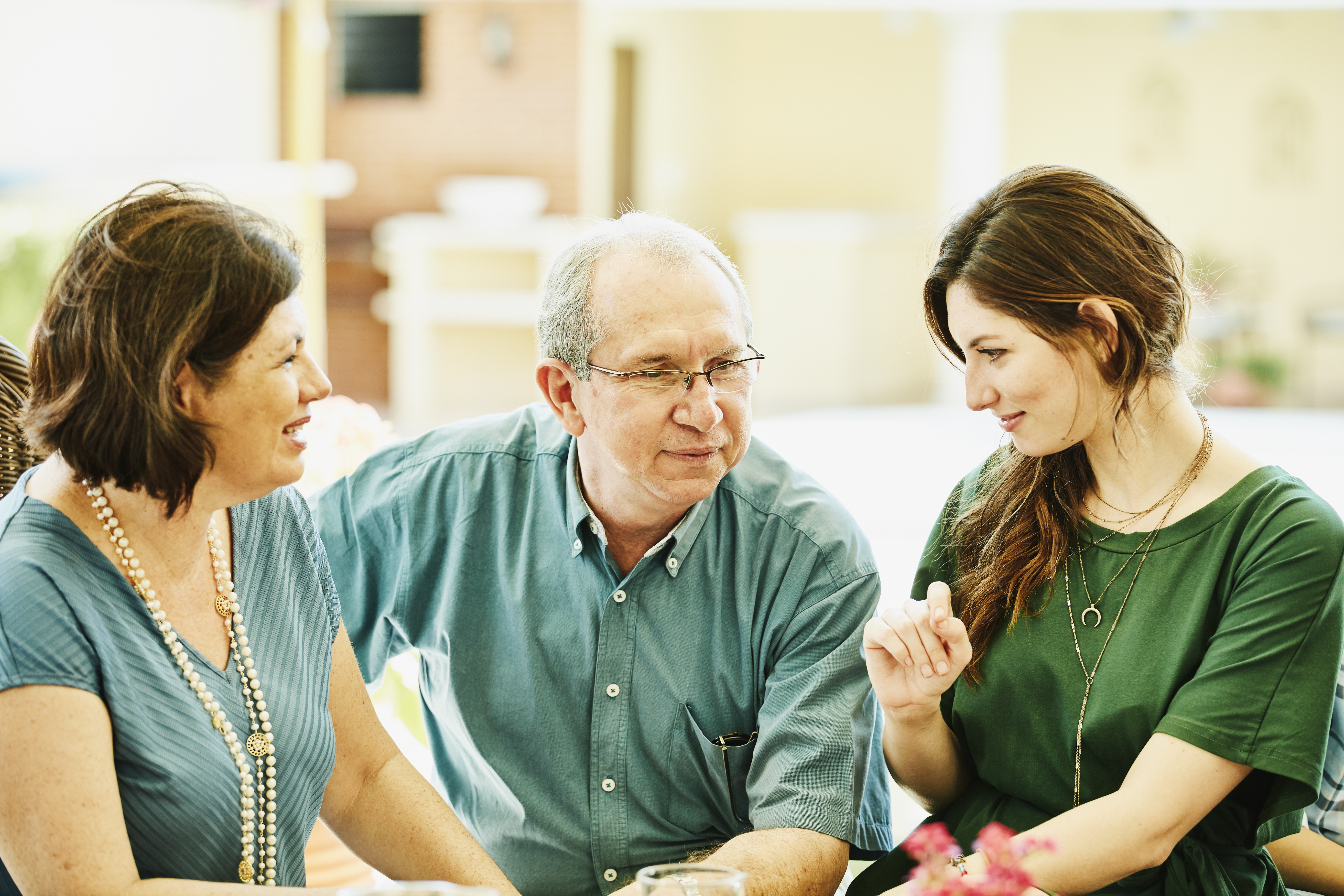 Parents listening to their daughter | Source: Getty Images