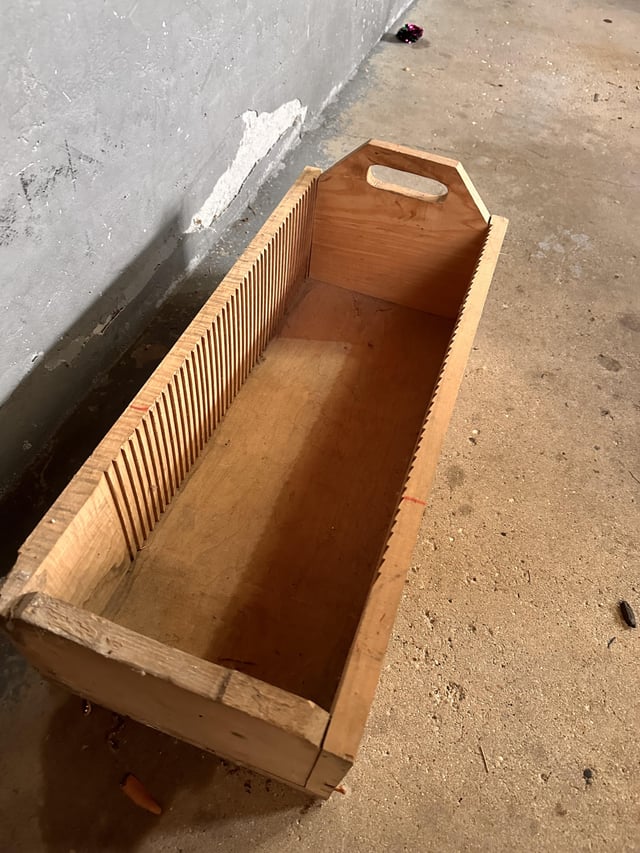 r/whatisthisthing - Four wooden boxes with grooves cut into the long sides of interior - what are these?