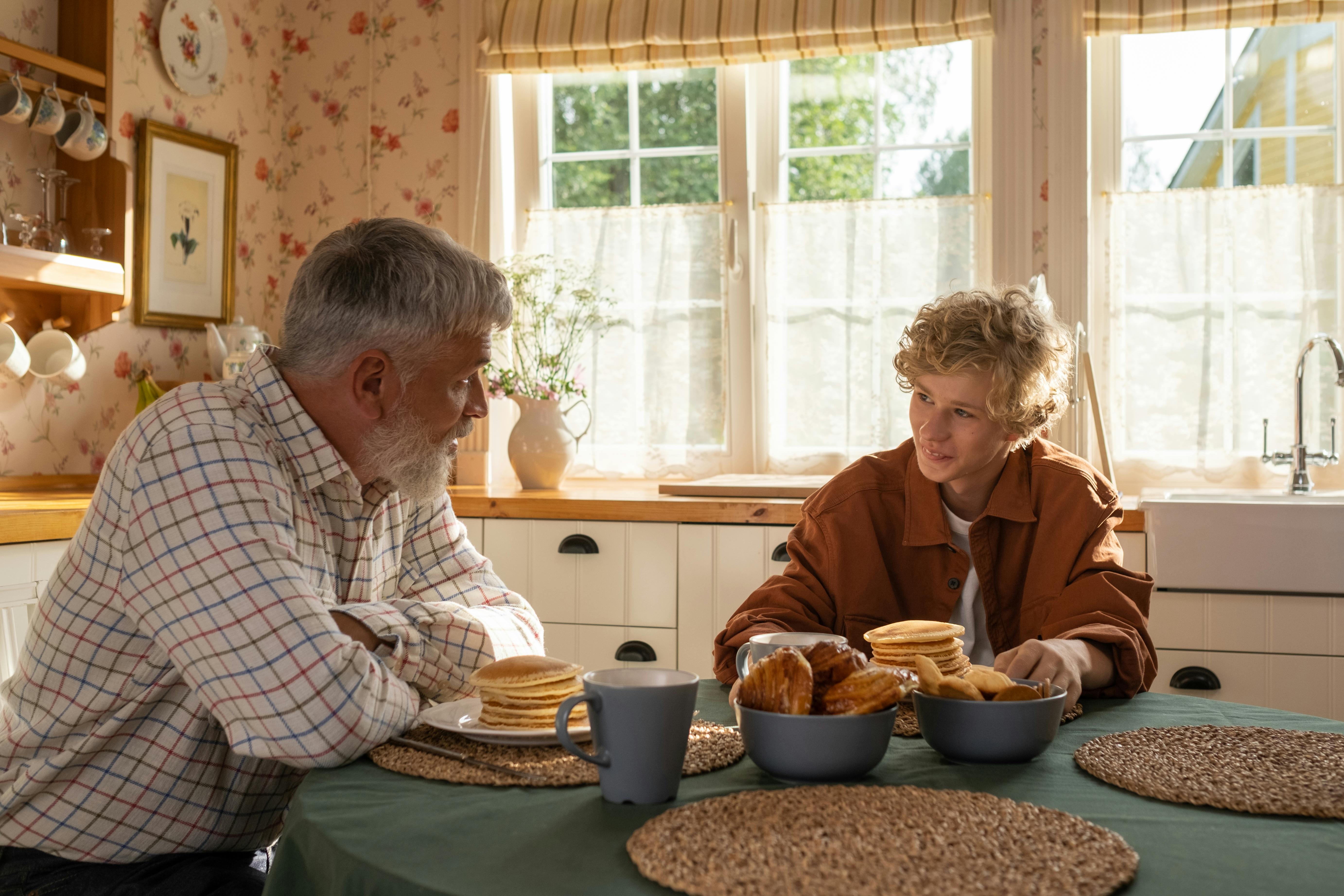 A grandfather and his grandson looking at each other | Source: Pexels