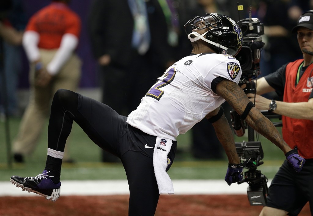 Ravens wide receiver Jacoby Jones (12) reacts after returning a kickoff for a over 100-yards for a touchdown during the second half of the NFL Super Bowl XLVII football game against the San Francisco 49ers